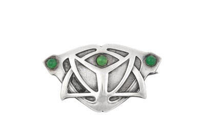 Lot 2038 - An Art Nouveau Green Stone Brooch the shield...