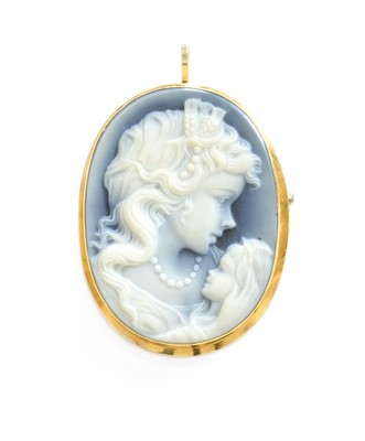 Lot 488 - A Hardstone Cameo Brooch/Pendant, carved to...