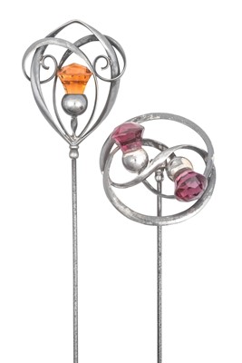 Lot 2028 - Two Glass Hat Pins, by Charles Horner the...