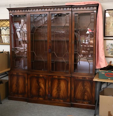 Lot 1419 - A Reproduction Mahogany Breakfront Bookcase,...