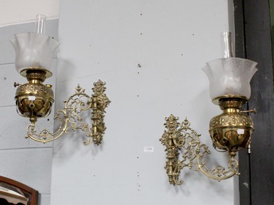 Lot 1344 - A Pair of Victorian Brass Oil Lamp Wall...