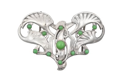 Lot 2033 - An Art Nouveau Green Glass Belt Buckle the two...