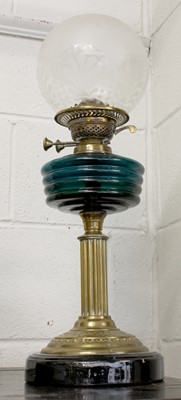 Lot 455 - A Victorian Brass Base Oil Lamp, with emerald...