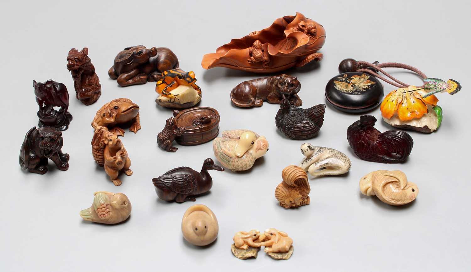 Lot 295 - A Collection of Reproduction Netsuke, hardwood...