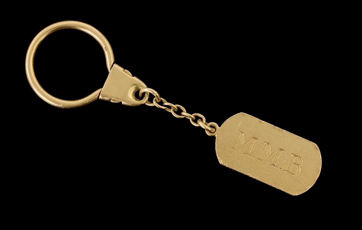 Lot 615 - An 18 Carat Yellow Gold Keyring, the oval fob...