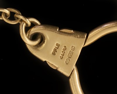 Lot 615 - An 18 Carat Yellow Gold Keyring, the oval fob...