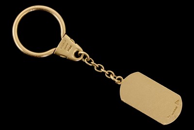 Lot 615 - An 18 Carat Yellow Gold Keyring, the oval fob...