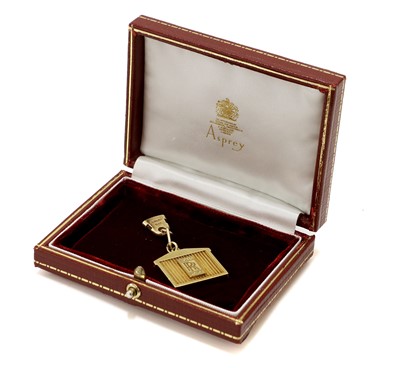 Lot 611 - An 18 Carat Yellow Gold Keyring, in the form...