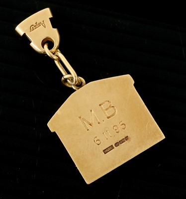 Lot 611 - An 18 Carat Yellow Gold Keyring, in the form...