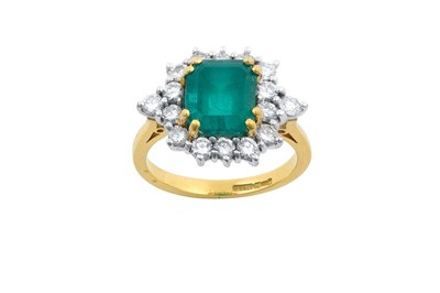 Lot 2297 - An 18 Carat Gold Emerald and Diamond Cluster...