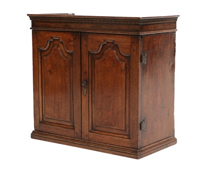 Lot 297 - A George II Oak Spice Cupboard, mid 18th...