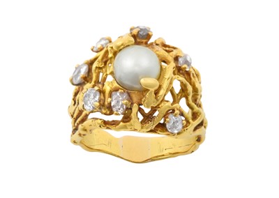 Lot 2094 - A Cultured Pearl and Diamond Ring the central...