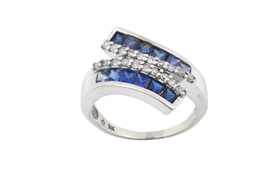 Lot 2111 - A Sapphire and Diamond Crossover Ring the...