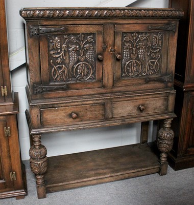 Lot 1275 - A 17th Century Style Carved Oak Cupboard on...