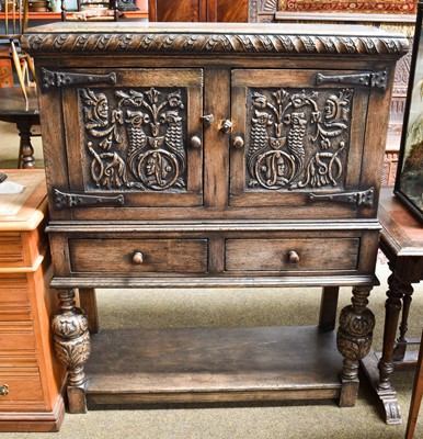 Lot 1493 - A Carved Oak Cupboard on Stand, in 17th...