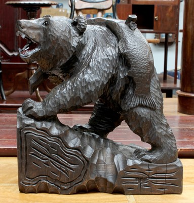 Lot 575 - A Black Forest Style Wooden Carving of a Bear...