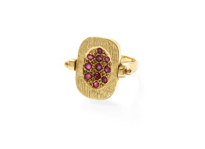 Lot 461 - A Ruby Cluster Ring, the yellow textured...