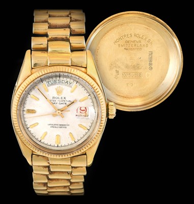 Lot 2138 - Rolex: A Rare 18 Carat Gold Automatic Day/Date...