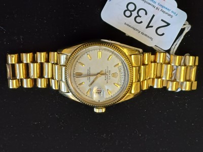 Lot 2138 - Rolex: A Rare 18 Carat Gold Automatic Day/Date...