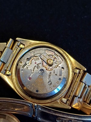 Lot 2138 - Rolex: A Rare 18 Carat Gold Automatic Day/Date...