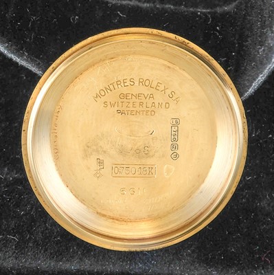 Lot 2138 - Rolex: A Rare 18 Carat Gold Automatic Day/Date...