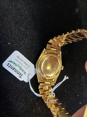 Lot 2138 - Rolex: A Rare 18 Carat Gold Automatic Day/Date...
