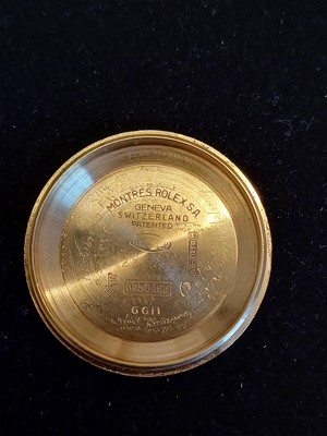 Lot 2138 - Rolex: A Rare 18 Carat Gold Automatic Day/Date...