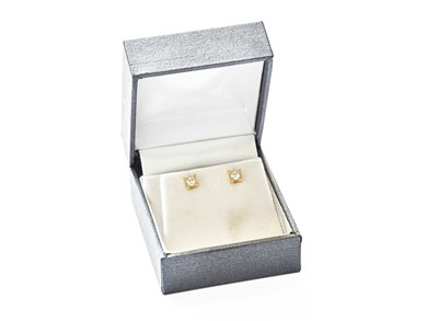 Lot 328 - A Pair of 18 Carat Gold Diamond Solitaire...