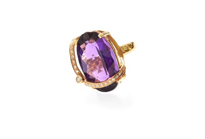 Lot 411 - An Amethyst and Diamond Ring, the oval cut...