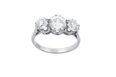 Lot 2296 - A Diamond Three Stone Ring the graduated old...