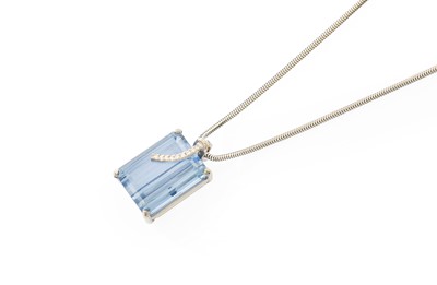 Lot 386 - A Synthetic Blue Spinel and Diamond Pendant on...