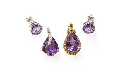 Lot 358 - An Amethyst and Diamond Pendant, the fancy cut...