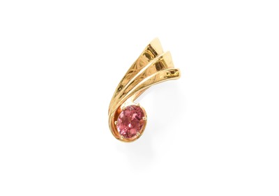 Lot 410 - A Pink Tourmaline Pendant, the oval cut pink...