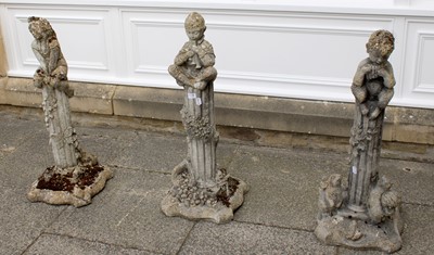 Lot 1175 - A Set of Three Weathered Composition Garden...