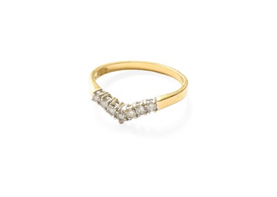 Lot 334 - An 18 Carat Gold Diamond Wishbone Ring, seven...