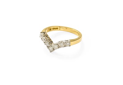 Lot 316 - An 18 Carat Gold Diamond Wishbone Ring, seven...