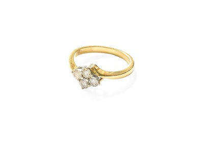 Lot 330 - An 18 Carat Gold Diamond Cluster Ring, four...