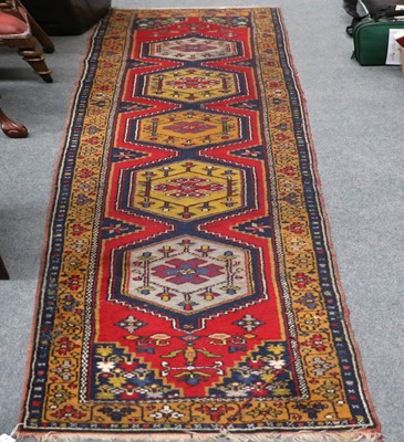 Lot 1218 - Anatolian Runner, with a column of five...