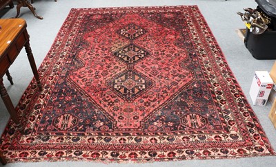 Lot 1220 - Kashgai Carpet, the raspberry lozenge field...