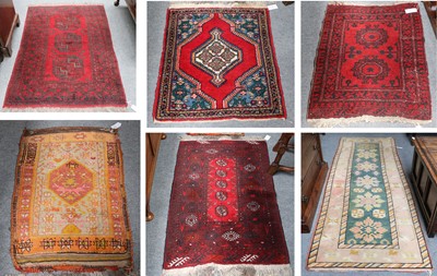 Lot 1225 - Three "Bukhara" Rugs, each with brick red...