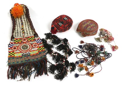 Lot 2121 - Twelve Afghan and Eastern Hats woven in...