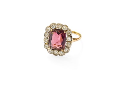 Lot 414 - A Purple Glass and Diamond Cluster Ring, the...