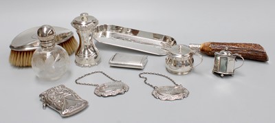 Lot 65 - A Collection of Assorted Silver, including an...