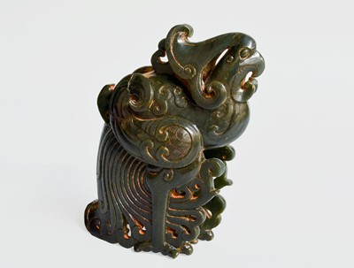 Lot 245 - A Chinese Carved Green Jade Phoenix, 20th...