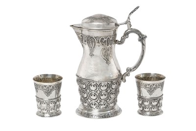 Lot 2279 - A German Parcel-Gilt Silver Jug and Two Beakers