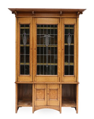 Lot 1346 - An Arts & Crafts Scottish School Oak Bookcase,...