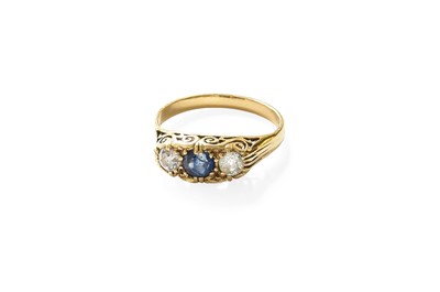 Lot 390 - A Sapphire and Diamond Three Stone Ring, the...