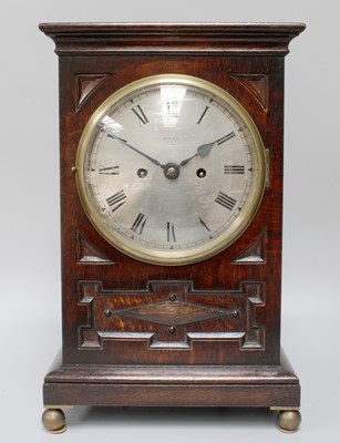 Lot 1332 - An Oak Striking Mantel Clock, early 20th...