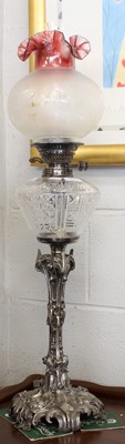 Lot 1473 - A Victorian Oil Lamp with Silver Plated...