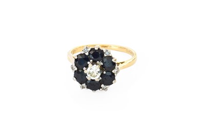 Lot 415 - An 18 Carat Gold Sapphire and Diamond Cluster...